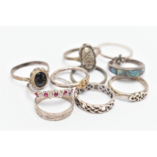 139 - TEN WHITE METAL RINGS, of various designs and sizes, some stamped 925, silver, some unmarked metal, ... 
