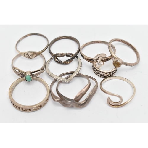 141 - TEN WHITE METAL RINGS, of various designs and sizes, some stamped 925, silver, some unmarked metal (... 