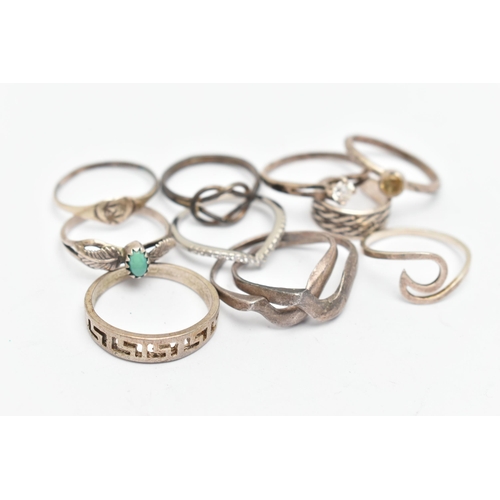 141 - TEN WHITE METAL RINGS, of various designs and sizes, some stamped 925, silver, some unmarked metal (... 