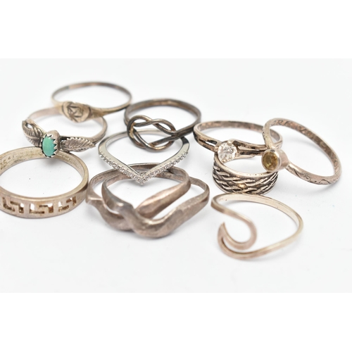 141 - TEN WHITE METAL RINGS, of various designs and sizes, some stamped 925, silver, some unmarked metal (... 