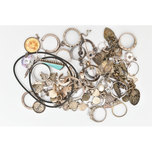 146 - A SELECTION OF SILVER AND WHITE METAL JEWELLERY, to include rings, a charm bracelet, necklaces, one ... 