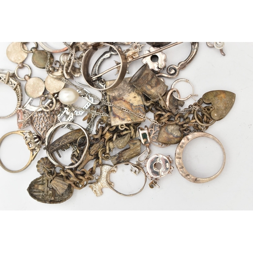 146 - A SELECTION OF SILVER AND WHITE METAL JEWELLERY, to include rings, a charm bracelet, necklaces, one ... 