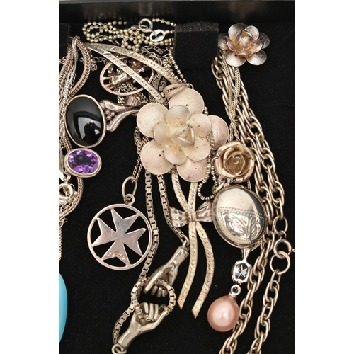 153 - A SELECTION OF SILVER AND WHITE METAL PENDANT NECKLACES, to include an oval locket, a Maltese cross ... 