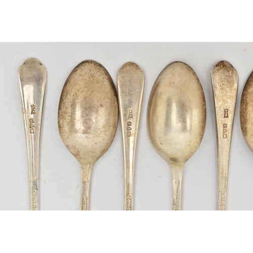168 - A SET OF NINE SILVER TEASPOONS, all with golf motifs to the terminals, all with silver hallmarks for... 