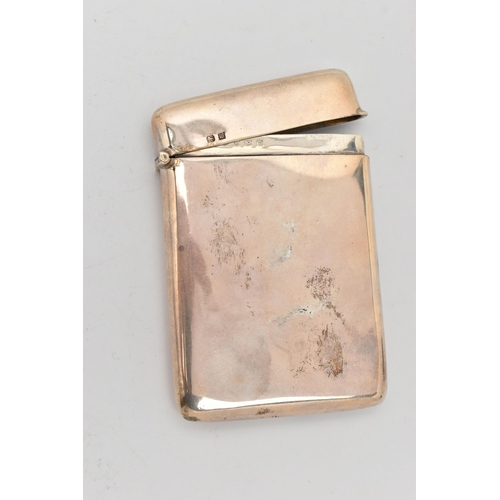 172 - AN EARLY 20TH CENTURY SILVER CARD CASE, of a polished rectangular form, hinged cover and gilt interi... 