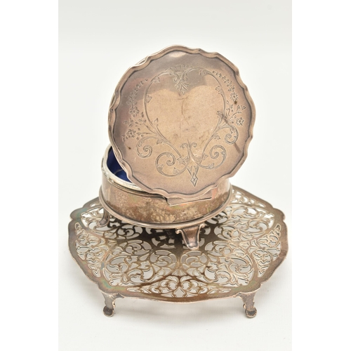 174 - A SILVER TRINKET BOX AND TRIVET, the trinket box of a circular form, etched floral pattern with vaca... 