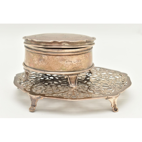 174 - A SILVER TRINKET BOX AND TRIVET, the trinket box of a circular form, etched floral pattern with vaca... 