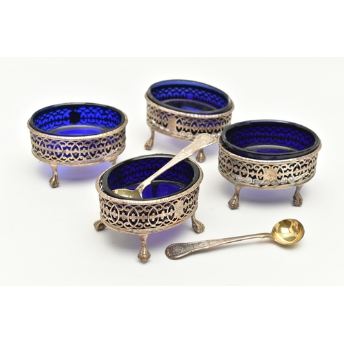 176 - A SET OF FOUR GEORGE III SILVER SALTS WITH TWO SPOONS, each of an oval pierced form with engraved cr... 