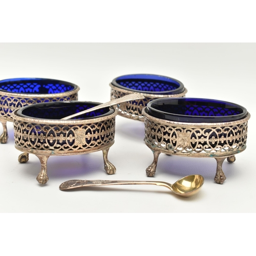 176 - A SET OF FOUR GEORGE III SILVER SALTS WITH TWO SPOONS, each of an oval pierced form with engraved cr... 