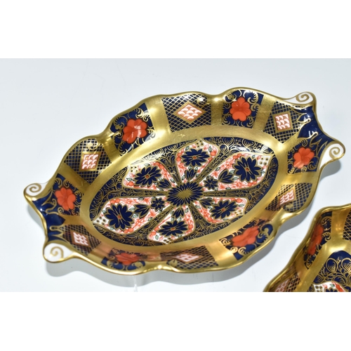 362 - TWO ROYAL CROWN DERBY IMARI 1128 - SOLID GOLD BAND TRINKET DISHES, comprising a wavy rimmed twin han... 