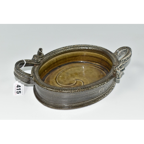 415 - WALTER KEELER (1942): A SALT GLAZED STONEWARE DISH, the oval dish with twin ribbon-style handles, an... 