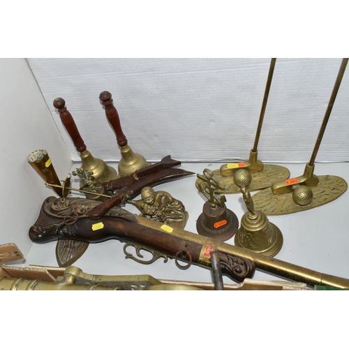 524 - A BOX AND LOOSE BRASSWARE, to include a brass cannon, length 46cm, brass wall plaques in the form of... 