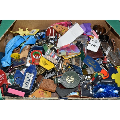 525 - TWO BOXES OF KEY RINGS, a large collection to include souvenir, advertising, Scouting and novelty ex... 