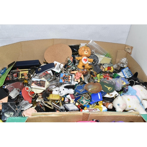 525 - TWO BOXES OF KEY RINGS, a large collection to include souvenir, advertising, Scouting and novelty ex... 