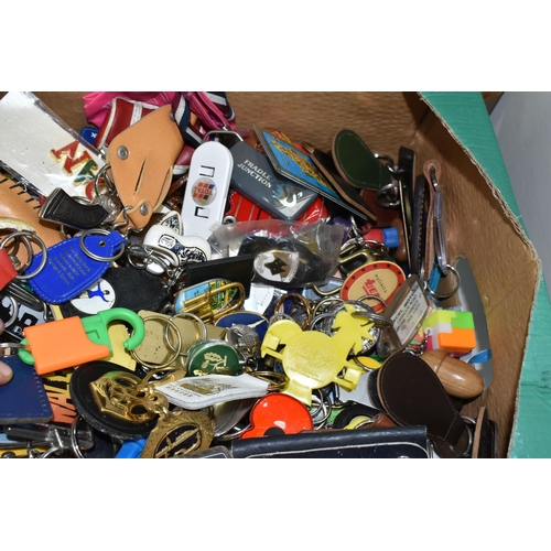 525 - TWO BOXES OF KEY RINGS, a large collection to include souvenir, advertising, Scouting and novelty ex... 