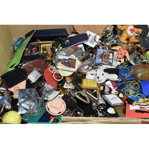 525 - TWO BOXES OF KEY RINGS, a large collection to include souvenir, advertising, Scouting and novelty ex... 