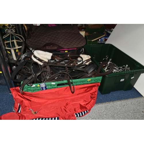 526 - THREE BOXES OF HORSE TACK, ETC, to include various different bits, bridle, reins, headcollar, girths... 