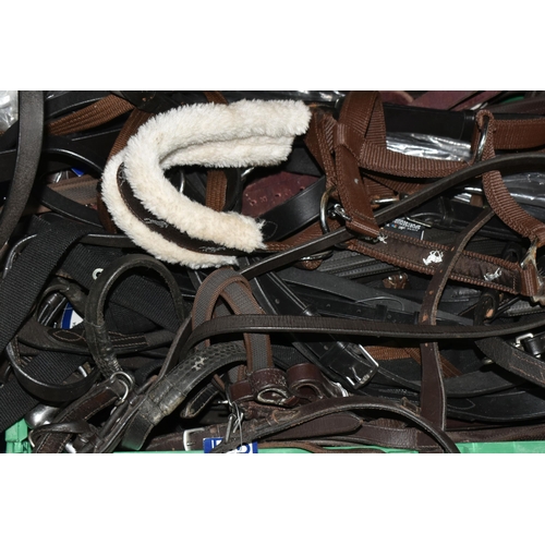 526 - THREE BOXES OF HORSE TACK, ETC, to include various different bits, bridle, reins, headcollar, girths... 