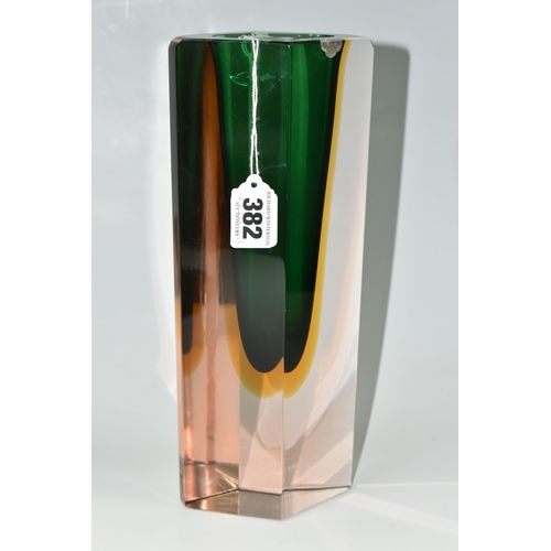 382 - A MID-CENTURY MURANO SOMMERSO FACETED GLASS BLOCK VASE, green and amber, height 26.5cm, foil sticker... 