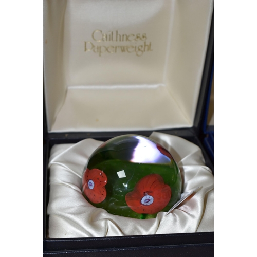 390 - TWO BOXED CAITHNESS GLASS PAPERWEIGHTS, comprising a limited edition 'Poppies' 48/750 (small scratch... 