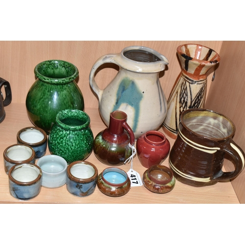 417 - FOURTEEN PIECES OF STUDIO POTTERY, to include two green glazed vases marked 'Fougard-Jourdan, Vallau... 