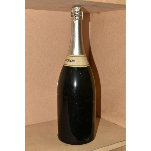 921 - One Magnum of DE VENOGE 1975 Blanc De Blancs Champagne, bottle dusty, seal intact, ullage approx. 2.... 