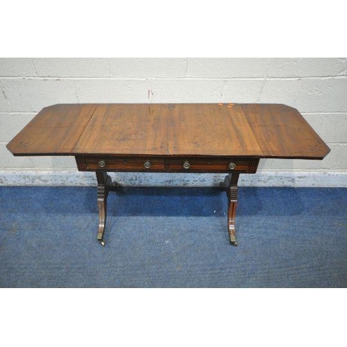 1200 - A GEORGIAN MAHOGANY DROP LEAF SOFA TABLE, with two frieze drawers, raised on twin supports and shape... 