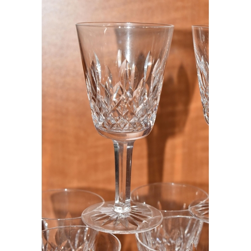 1200A - A SET OF SIX WATERFORD LISMORE  WINE GLASSES, comprising eleven with inscribded mark to the base and... 