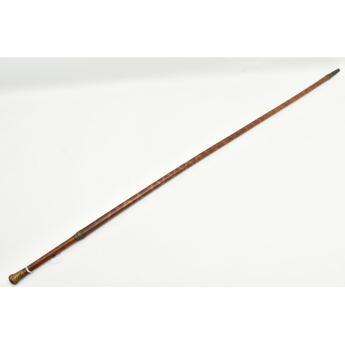 1227A - A REGENCY BAMBOO WALKING CANE, with tooled gilt brass handle and mount, the shaft decorated with a s... 