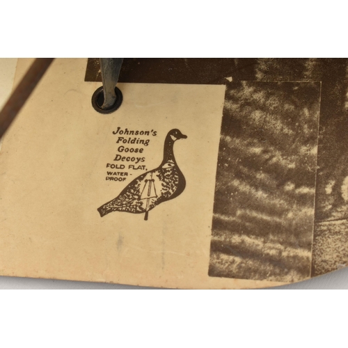 911A - A JOHNSON'S FOLDING STAKE-OUT CANADA GOOSE DECOY, complete with metal stand, the decoy is a lithogra... 