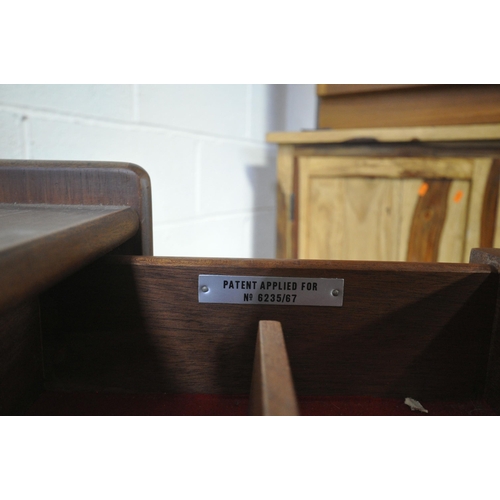 1213 - A.H. MCINTOSH AND CO LIMITED, KIRKCALDY, SCOTLAND, A MID CENTURY TEAK TROLLEY, with a fold over surf... 