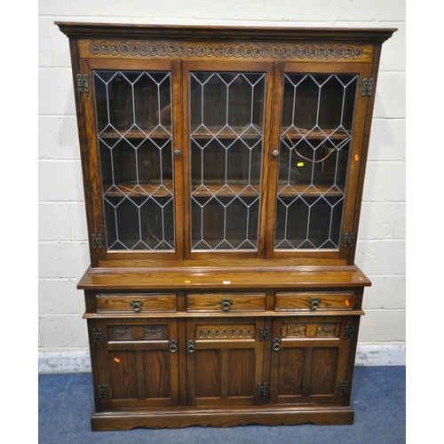 1220 - AN OLD CHARM LANCASTER DRESSER, fitted with three lead glazed doors, atop a base with three drawers,... 