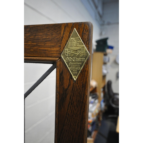 1220 - AN OLD CHARM LANCASTER DRESSER, fitted with three lead glazed doors, atop a base with three drawers,... 