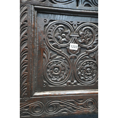 1222 - A GEORGIAN AND LATER OAK COFFER, the panels with scrolled and geometric carvings, width 126cm x dept... 