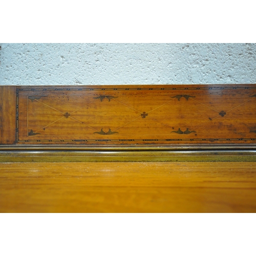 1228 - AN EDWARDIAN SATINWOOD BOWFRONT SIDEBOARD, with a raised back, fitted with two cupboard doors, flank... 