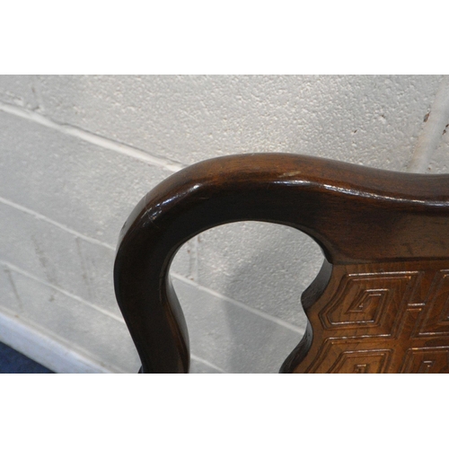 1230 - A PAIR OF ORIENTAL HARDWOOD CHAIRS, with a shaped backrest, central splat, gold stripped upholstery,... 