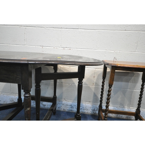 1236 - A 20TH CENTURY OAK GATE LEG TABLE, raised on turned supports, open width 132cm x closed width 45cm x... 