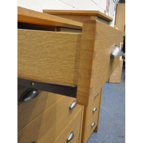 1245 - A MODERN OAK CHEST OF TWO SHORT OVER FOUR LONG DRAWERS, width 93cm x depth 46cm x height 106cm, alon... 