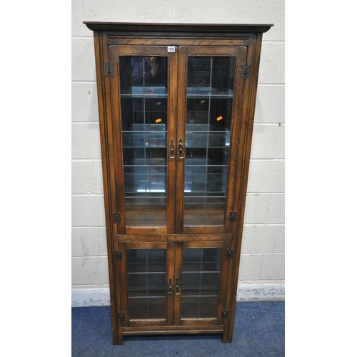 1252 - A 20TH CENTURY OAK DISPLAY CABINET, with two pairs of lead glazed doors, width 80cm x depth 37cm x h... 