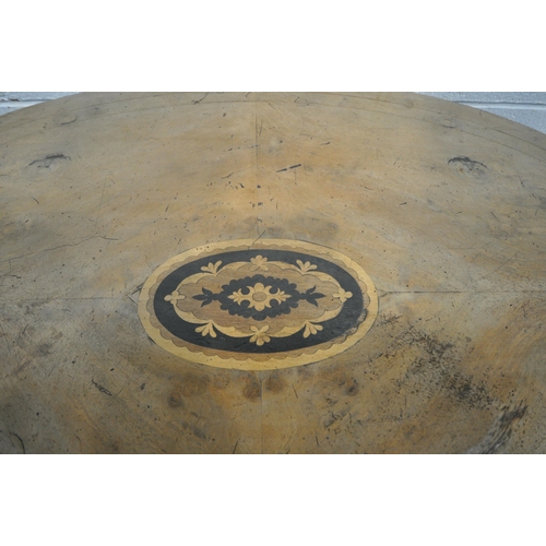 1267 - A 19TH CENTURY WALNUT TILT TOP OVAL LOO TABLE, with marquetry inlay to centre, raised on a turned su... 