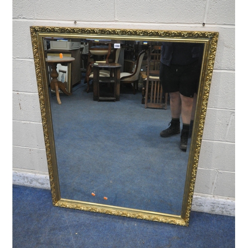 1268 - A LARGE RECTANGULAR GILT FRAME BEVELED EDGE WALL MIRROR, 128cm x 100cm (condition report: small chip... 