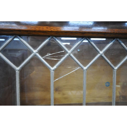 1273 - A 20TH CENTURY OAK GLOBE WERNICKE LIMITED SECTIONAL ELASTIC BOOKCASE, with three lead glazed hide an... 