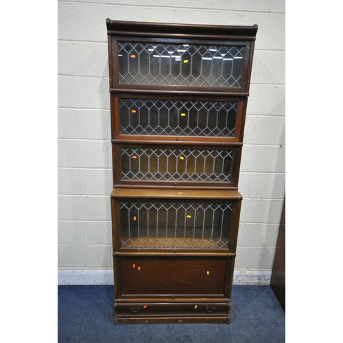 1274 - A 20TH CENTURY OAK GLOBE WERNICKE LIMITED SECTIONAL ELASTIC BOOKCASE, with three lead glazed hide an... 