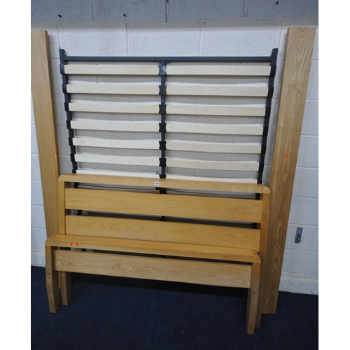 1276 - A MODERN LIGHT OAK 4FT6 BEDSTEAD, with side rails, metal framed slats and bolts (condition report: g... 