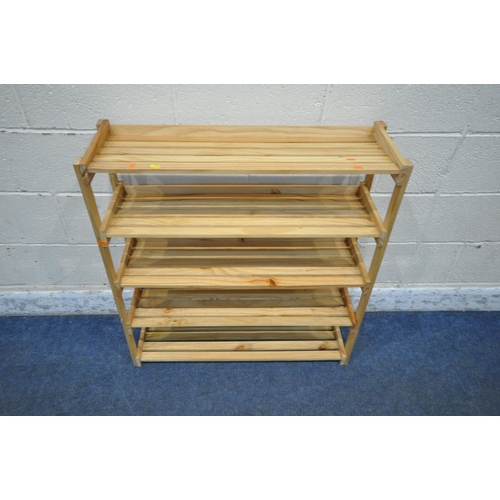 1269 - A MODERN SOLID OAK BOOKCASE, fitted with double glazed doors, above double cupboard doors, width 94c... 