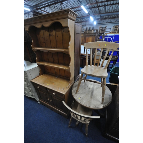 1287 - A LATE 20TH CENTURY PINE DRESSER, the two tier plate rack atop a base, fitted with two drawers, abov... 