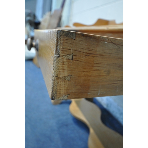 1295 - A 19TH CENTURY PINE WASHSTAND, with raised back and sides, two frieze drawers, raised on shaped legs... 