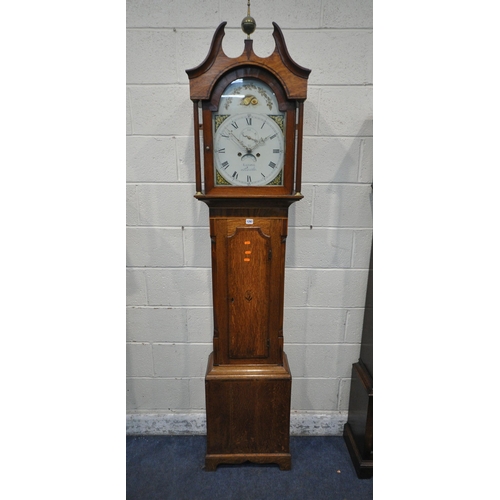 1297 - A GEORGIAN OAK CASED EIGHT DAY LONGCASE CLOCK, with scrolled pediment, flanking a brass finial, the ... 