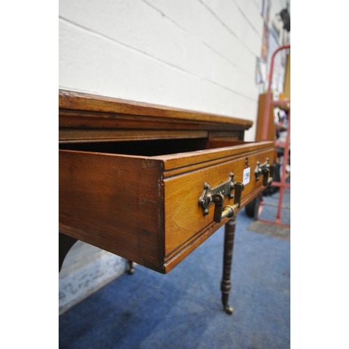 1299 - AN EDWARDIAN WALNUT DESK, with a green leather writing surface, three frieze drawers, turned and tap... 