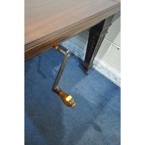 1300 - AN EDWARDIAN MAHOGANY WIND OUT DINING TABLE, with two additional leaves raised on square tapered leg... 